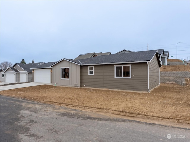 single story home featuring a garage