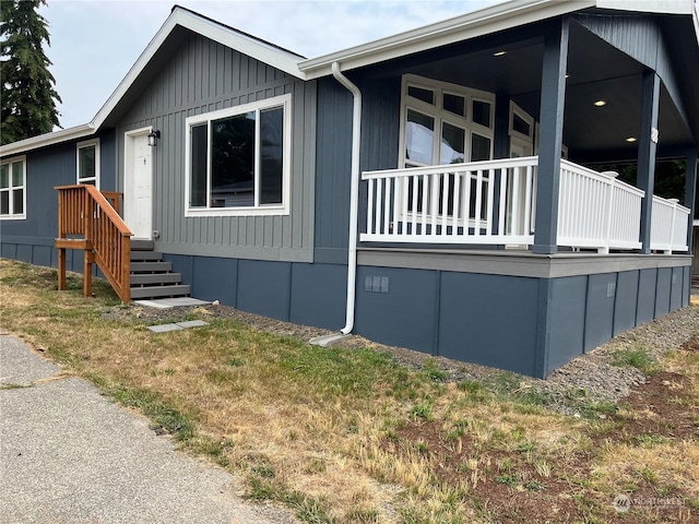 view of property exterior featuring a yard