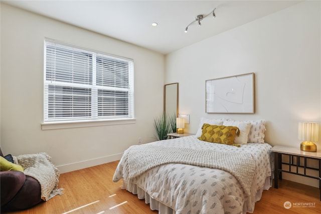 bedroom featuring hardwood / wood-style flooring