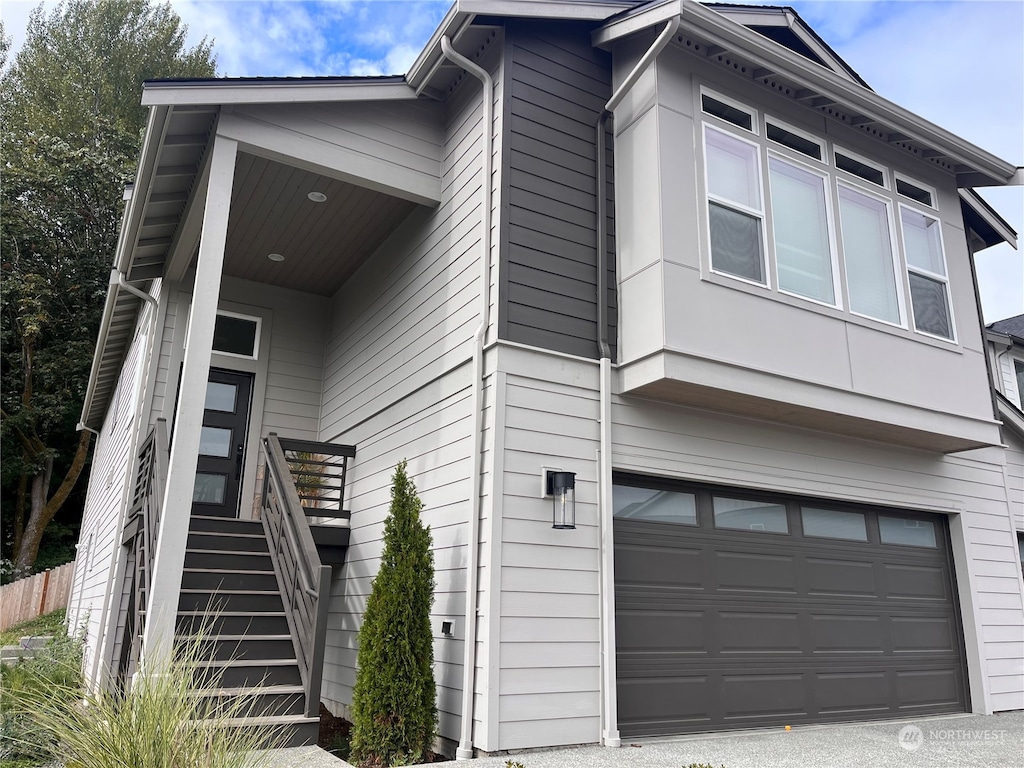 view of property exterior featuring a garage