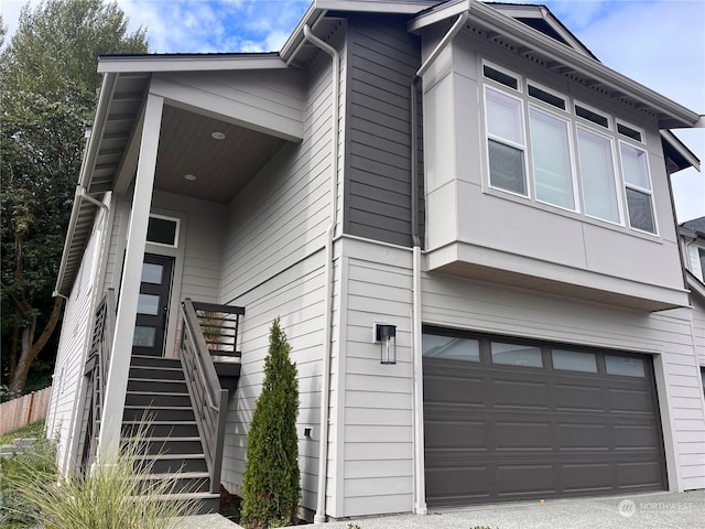 view of property exterior featuring a garage