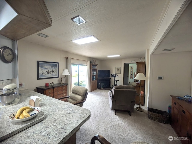 kitchen featuring carpet floors