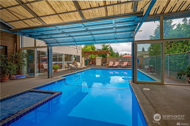 view of swimming pool featuring a patio