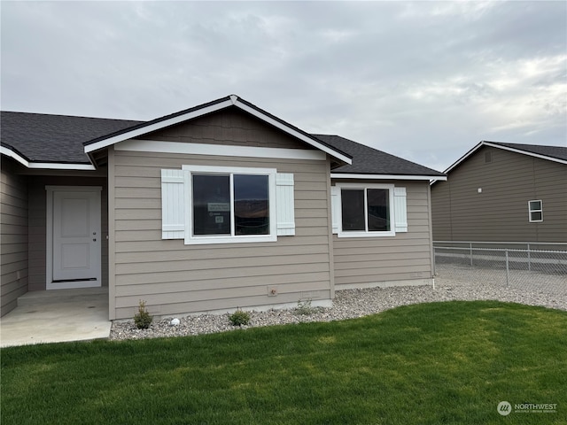 view of home's exterior featuring a yard