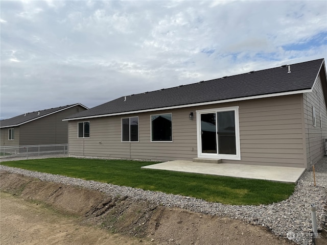 rear view of house with a patio area