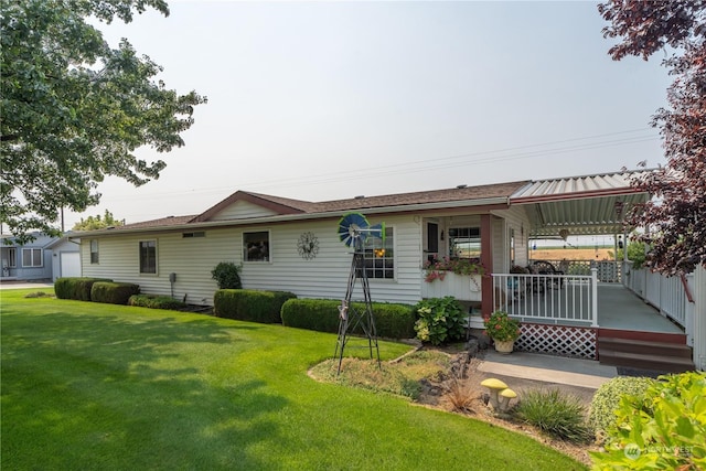 view of front of property with a front lawn