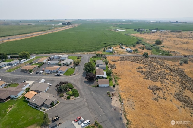 aerial view featuring a residential view and a rural view