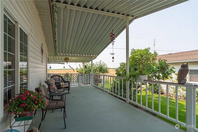 balcony featuring a porch