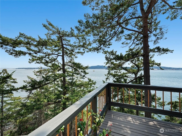 deck featuring a water view