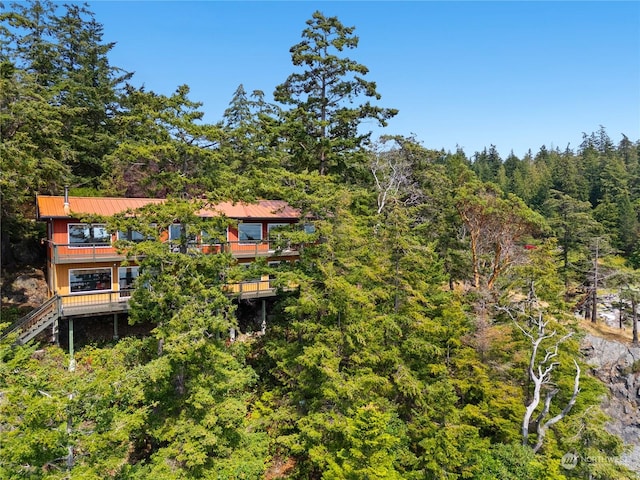 bird's eye view with a view of trees