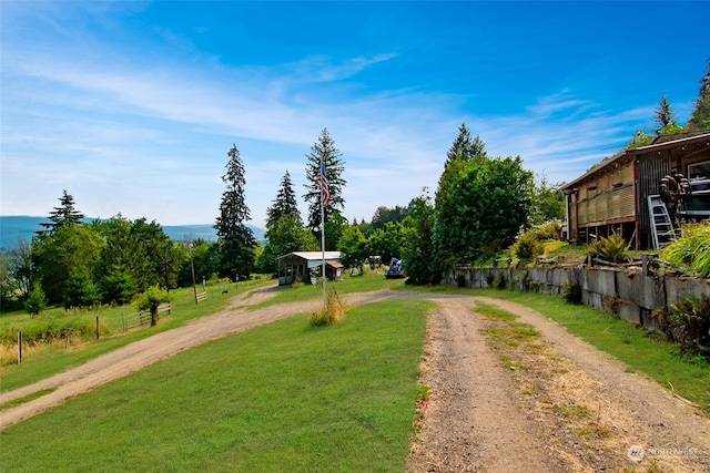 exterior space featuring a yard and a deck