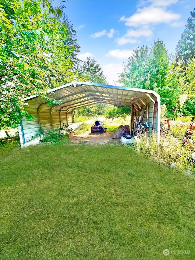 view of yard featuring a carport