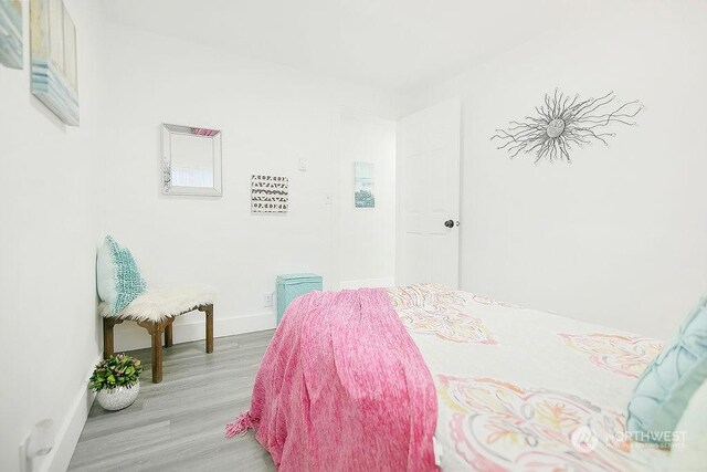 bedroom featuring hardwood / wood-style flooring