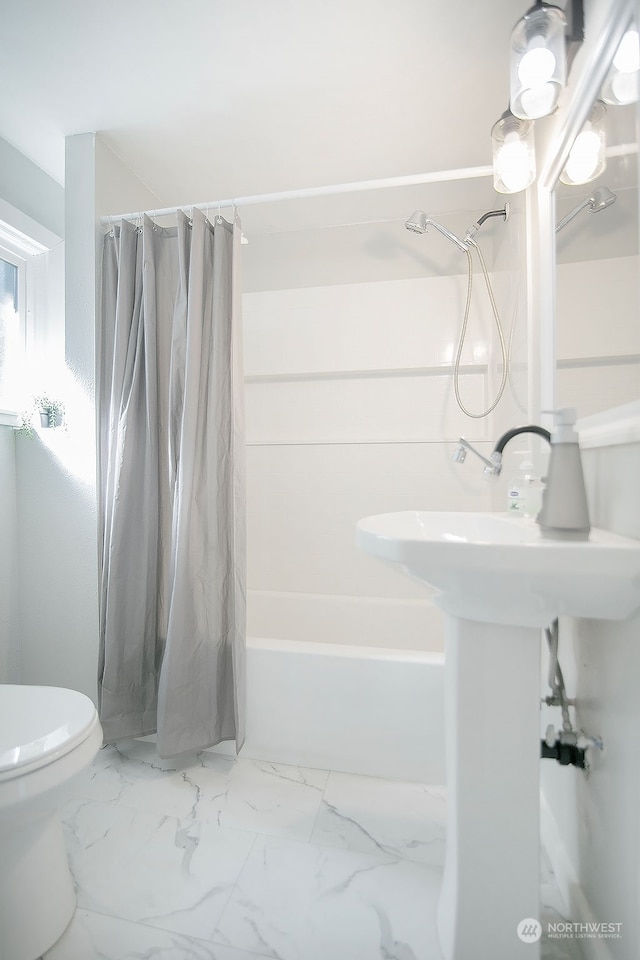 bathroom featuring tile patterned flooring, toilet, and shower / bathtub combination with curtain