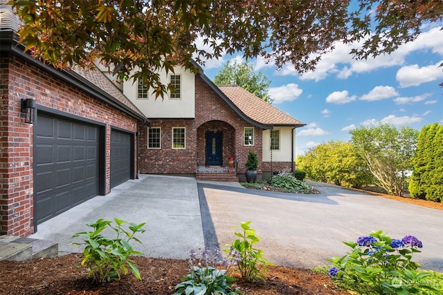 view of front of home with a garage