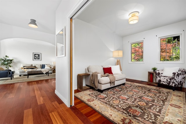 living area with hardwood / wood-style flooring