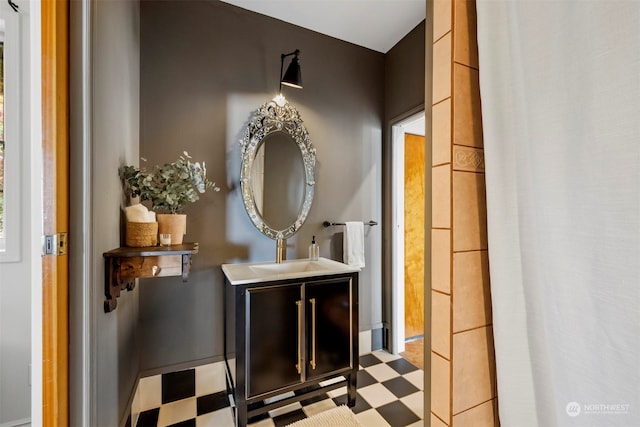 bathroom featuring vanity and tile patterned flooring