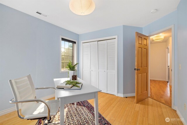 office space featuring light wood-type flooring