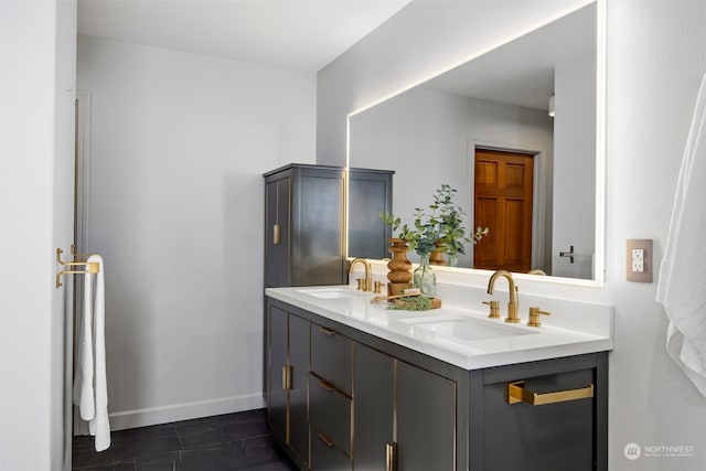 bathroom featuring tile patterned floors and dual bowl vanity