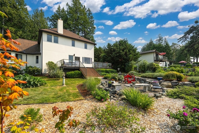 view of yard with a wooden deck