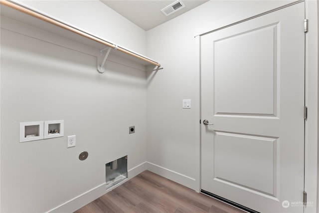 laundry room with hookup for an electric dryer, light hardwood / wood-style floors, and washer hookup