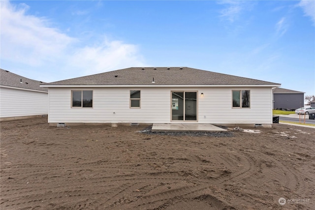 rear view of property featuring a patio area