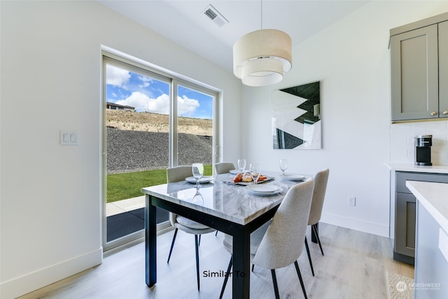 dining area featuring light hardwood / wood-style flooring