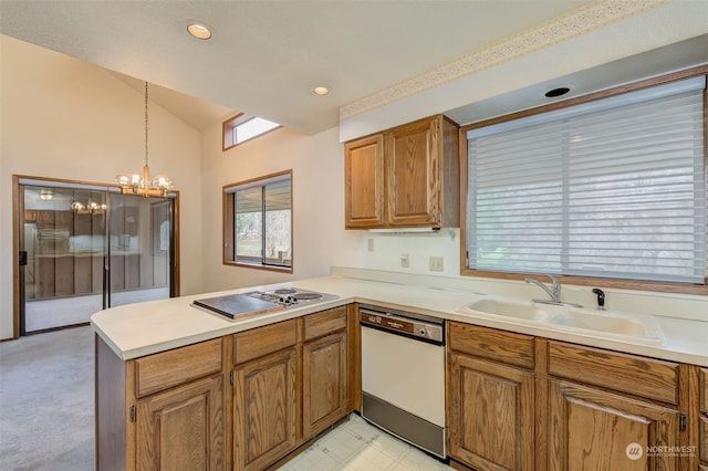 kitchen with kitchen peninsula, sink, and dishwasher