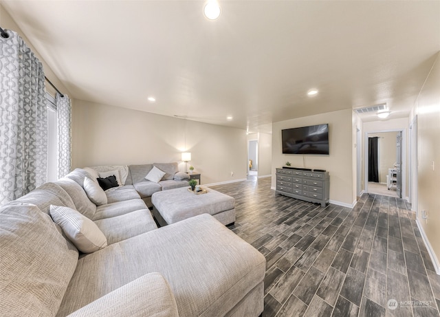 living room featuring dark hardwood / wood-style floors