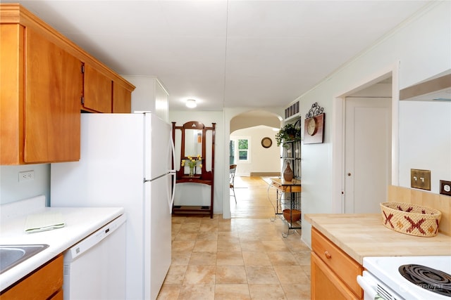 kitchen with dishwasher and light tile patterned floors