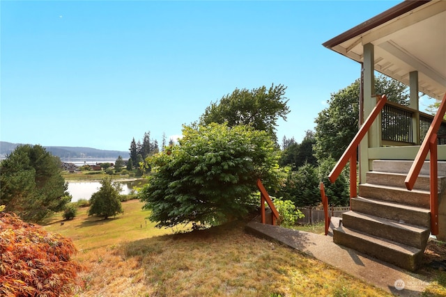 view of yard with a water view