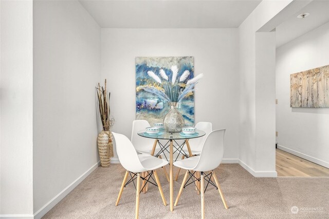 dining room featuring light wood-type flooring