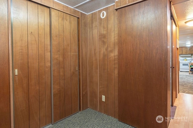 details with wooden walls and white stove