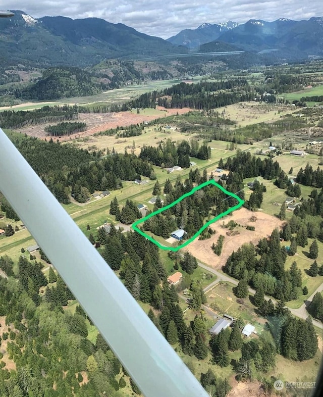 bird's eye view with a mountain view