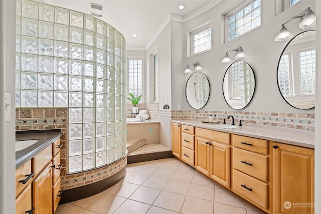 bathroom featuring crown molding, tile patterned flooring, vanity, and tasteful backsplash