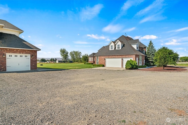 view of home's exterior with a garage