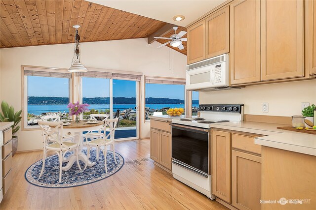 kitchen featuring light brown cabinets, white appliances, and wood ceiling