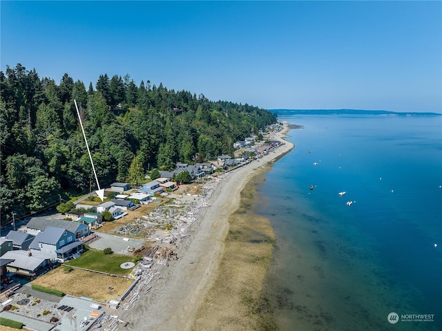 drone / aerial view featuring a view of the beach and a water view
