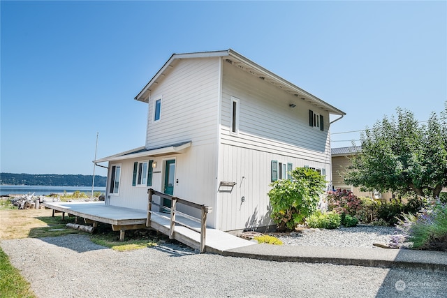 exterior space with a water view