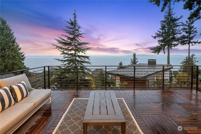 deck at dusk with a water view