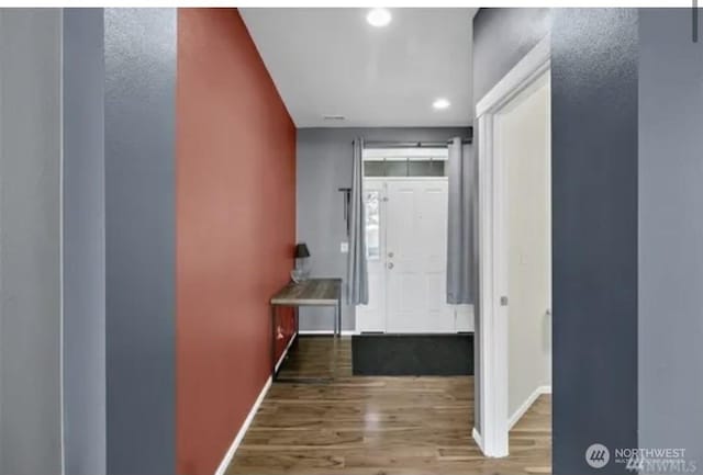 8022 175th Street Ct E, Puyallup, WA 98375 - corridor featuring baseboards, wood finished floors, and recessed lighting