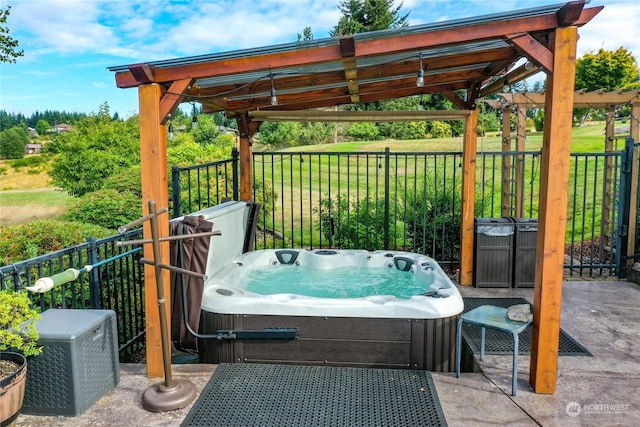 view of patio with a hot tub