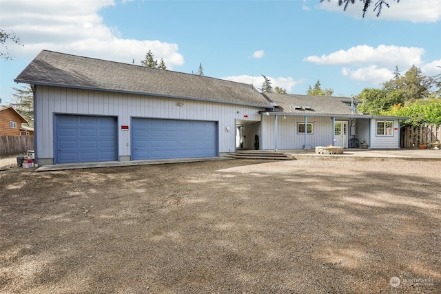 ranch-style home with a garage