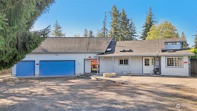 view of front of property featuring a garage