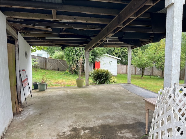 view of patio / terrace with a storage shed