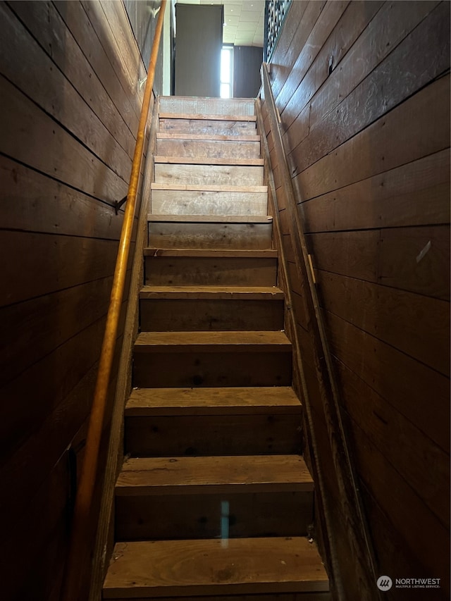 stairs with wooden walls