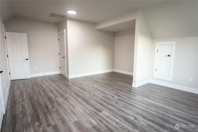 bonus room featuring lofted ceiling and hardwood / wood-style floors