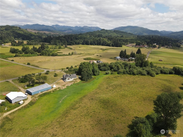 drone / aerial view with a rural view and a mountain view