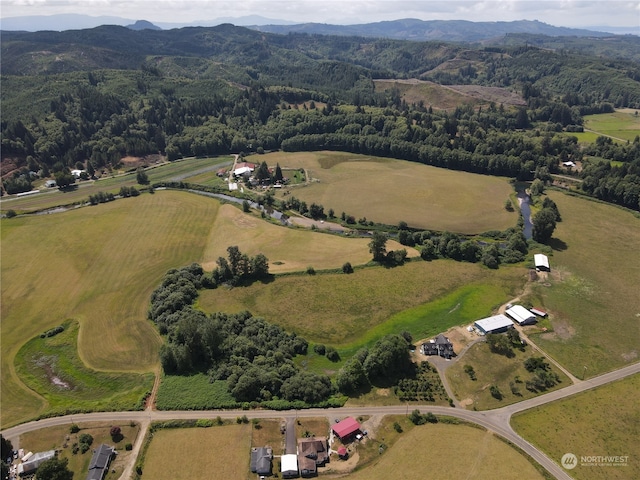 aerial view featuring a rural view and a mountain view