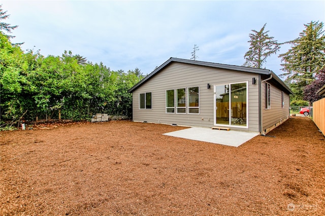 back of house featuring a patio area